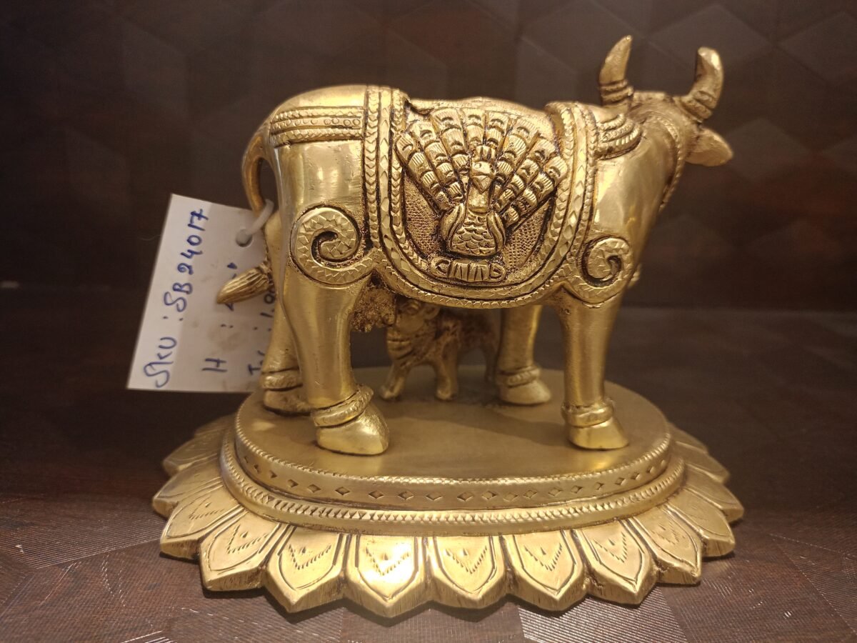 brass handcrafted kamadhenu with radha krishna base idol 1 scaled