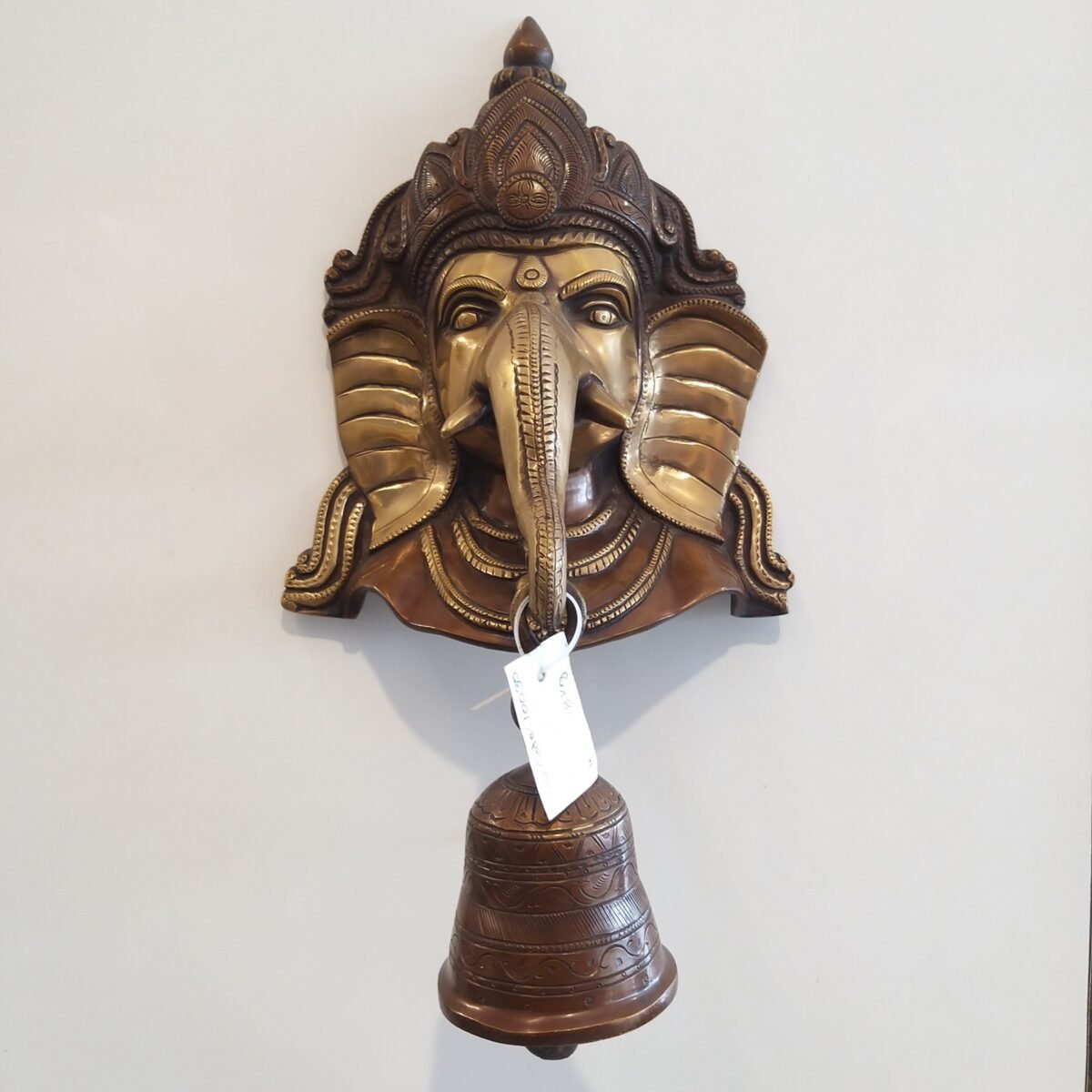 brass ganesha face with bell idol wall hanging home decor pooja item hindu god statues buy online india 10030
