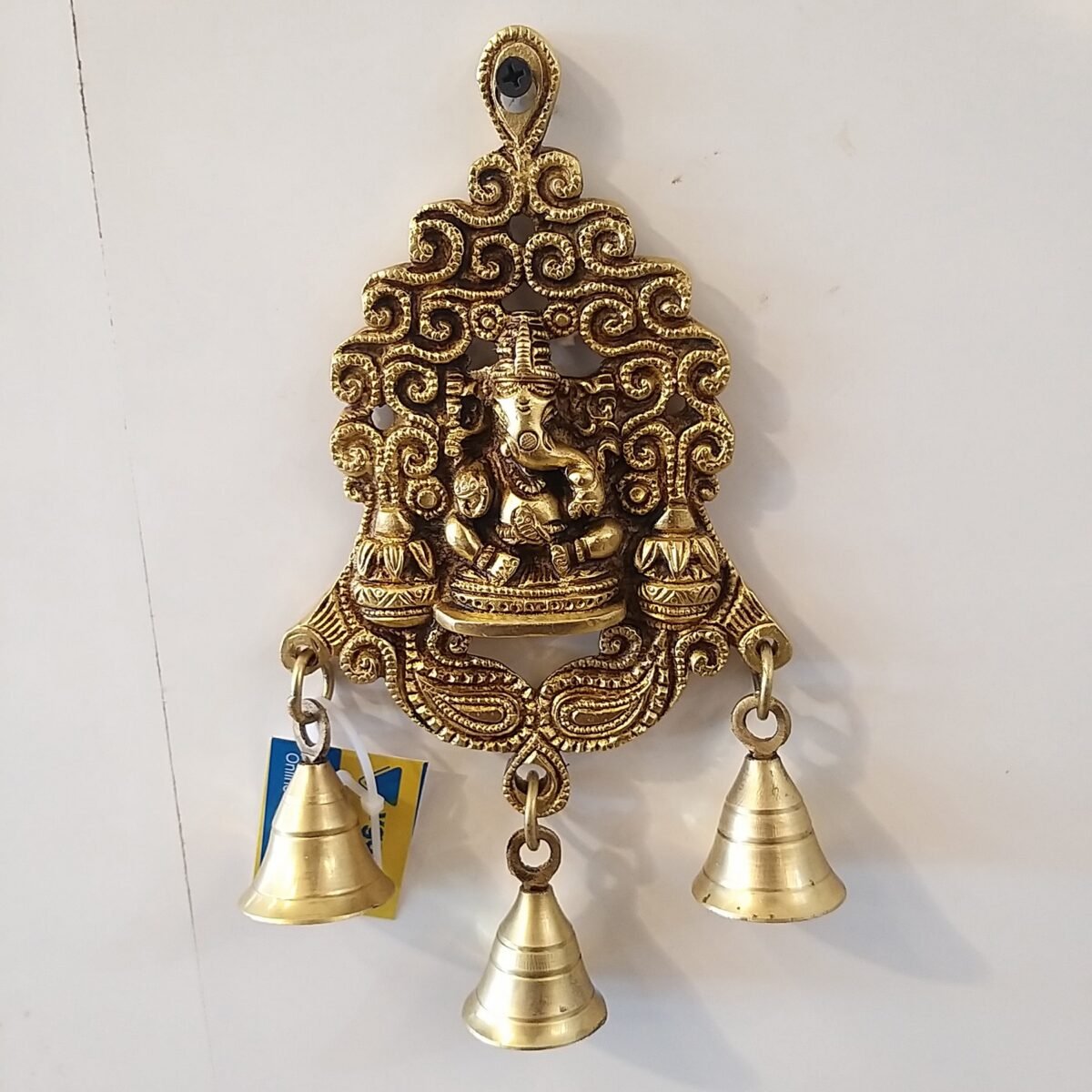 brass ganesha wall hanging small with bell home decor wall decor pooja items showpiece temple auspicious gift present buy online india 10193