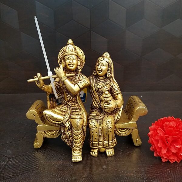 Brass Radha Krishna Sitting On Sofa Idol