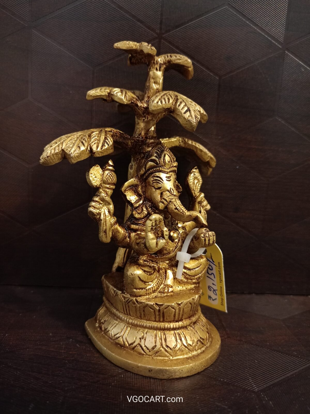 brass ganesha sitting behind the tree online gift coimbatore india 1 scaled