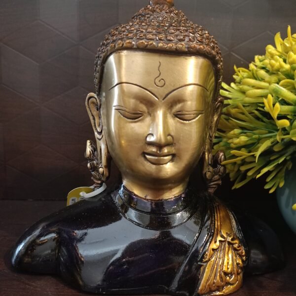 brass colored buddha idol