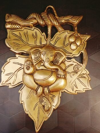 brass-ganesha-on-leaf-wall-mount-