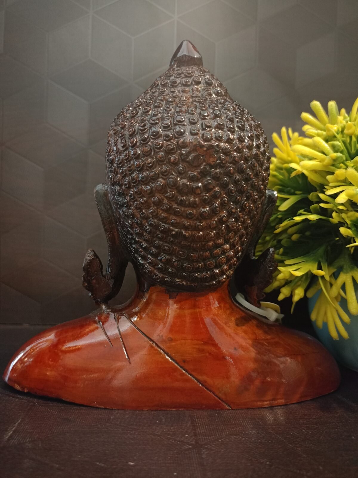 brass color buddha idol