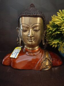 brass color buddha idol