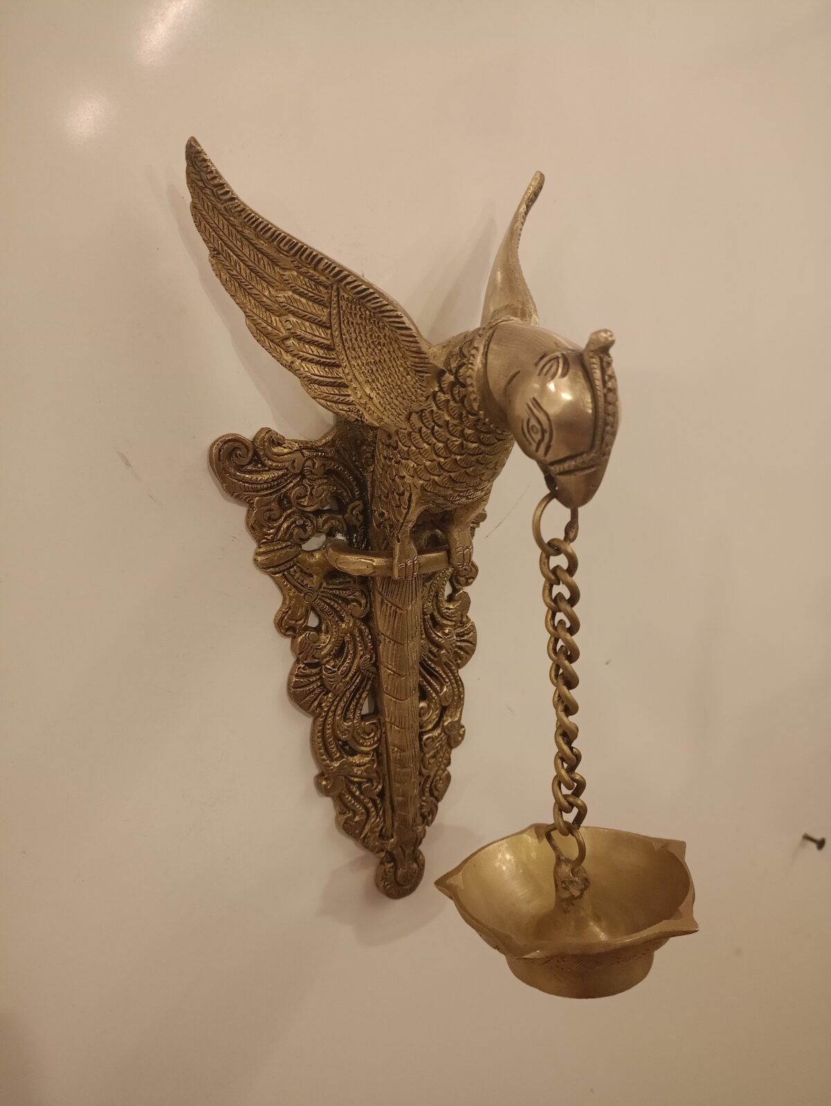 buy brass wall mount parrot holding diya online india 1 scaled