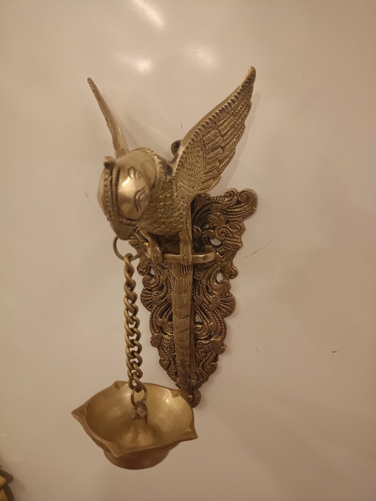 buy brass wall mount parrot holding diya online india 2 scaled