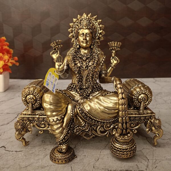Brass Maha Lakshmi Sitting On Sofa 7"