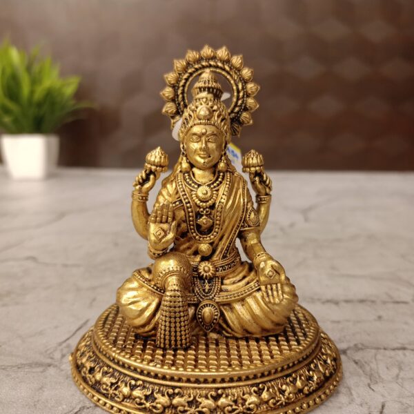 Brass Fine Art Lakshmi Sitting On Oval Base 3.5"